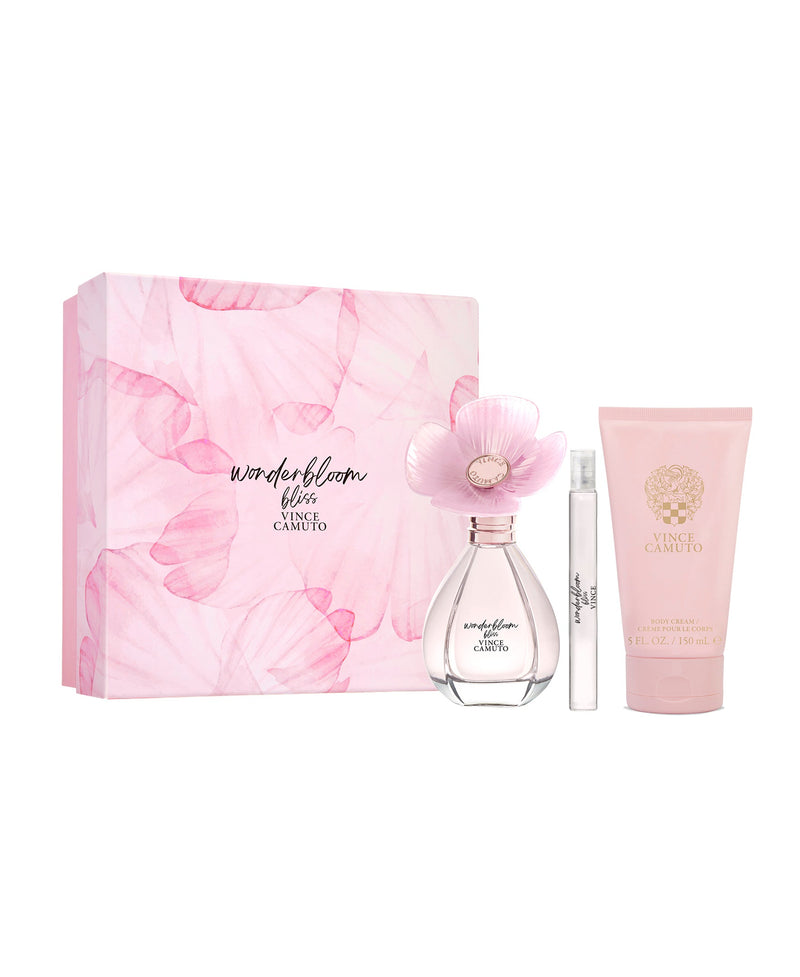 The Vince Camuto Wonderbloom Bliss 3-Piece Set includes Eau de Parfum in a pink floral bottle with flower cap, a matching travel spray, and a pink scented lotion, all beautifully packaged.