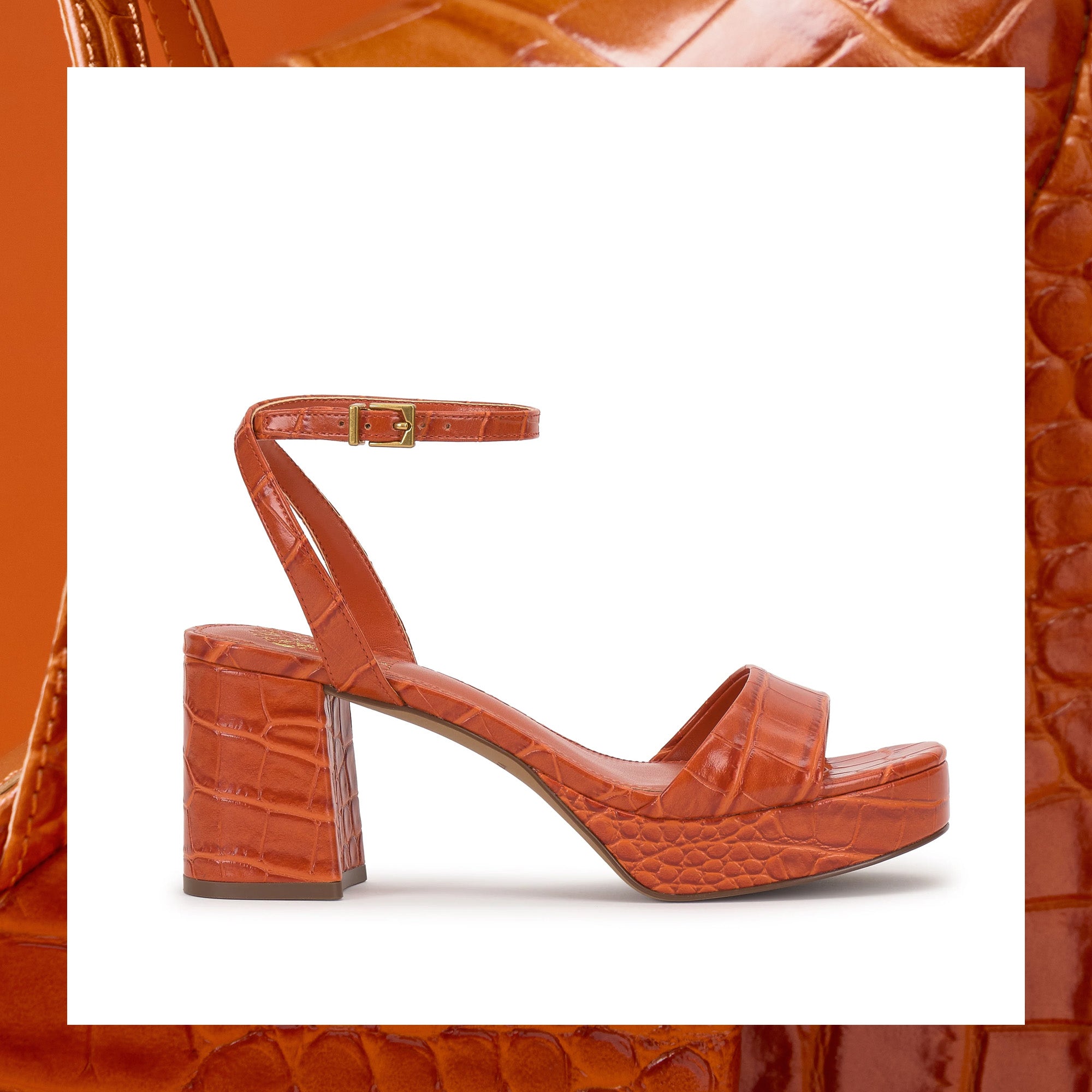 Brown crocodile-patterned sandal on a white background