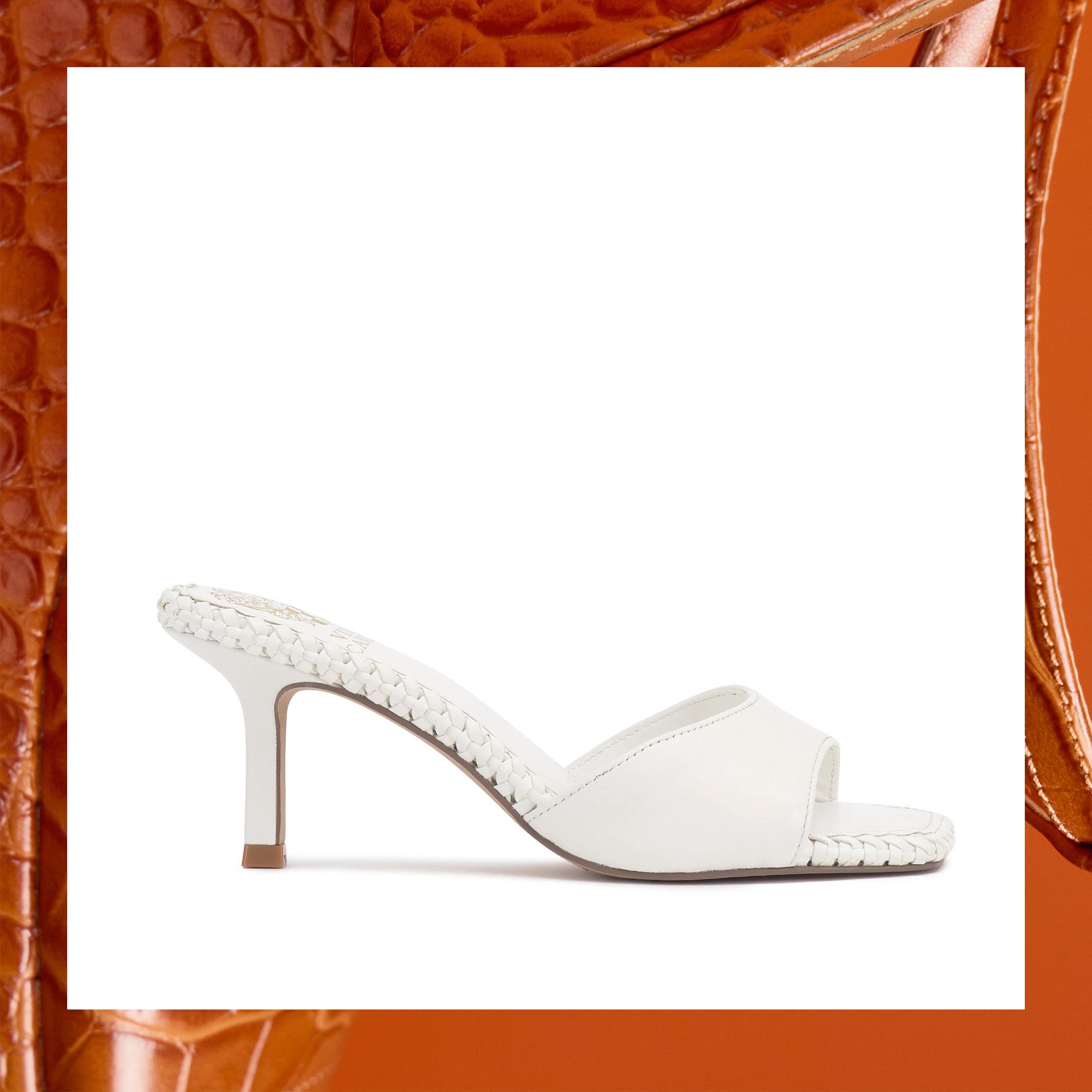 White high-heeled shoe on a white background