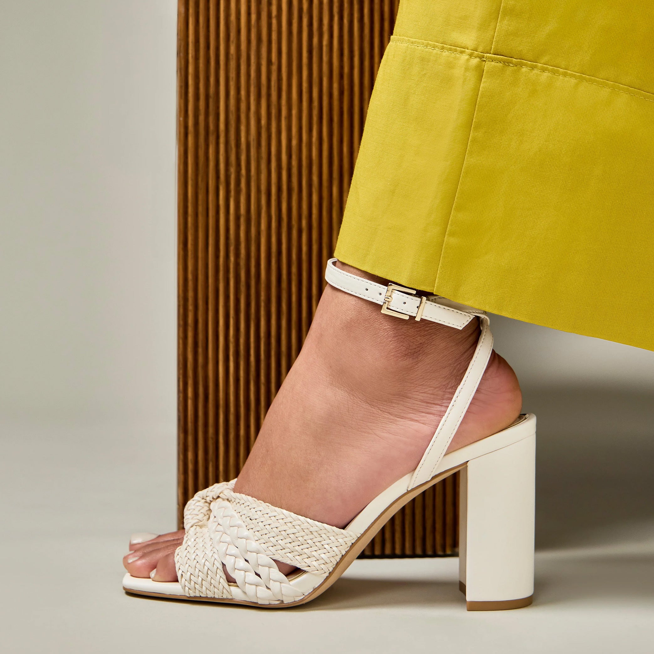 Women wearing the Hanlea sandal in white