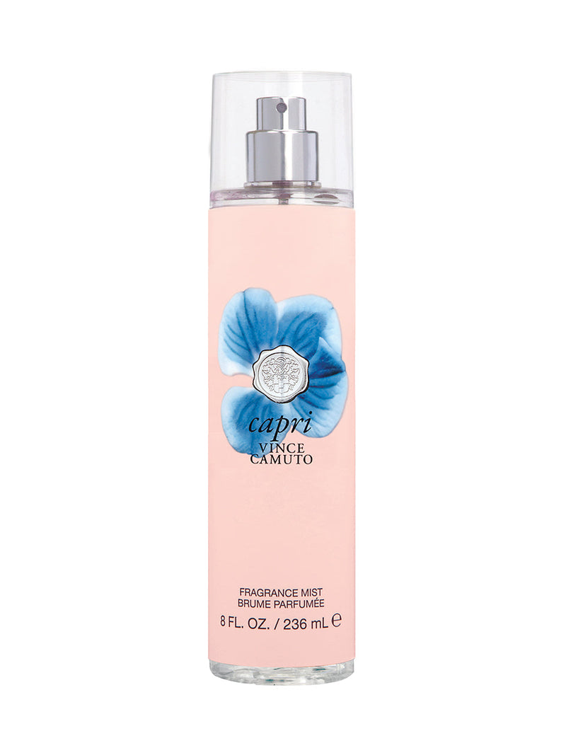 Capri Body Mist 8.0 oz by Vince Camuto comes in a clear spray bottle with a pink label, blue flower graphic, and silver cap. It offers a floral fruity fragrance highlighted by a refreshing citrus blend.