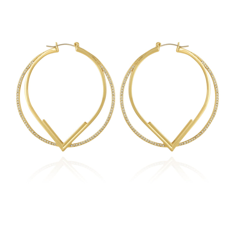 The Vince Camuto Double Hoop V Pave Earrings feature a gold V-shaped design with a thinner pave hoop accented by clear stones on the outer edge, all elegantly showcased against a white background.