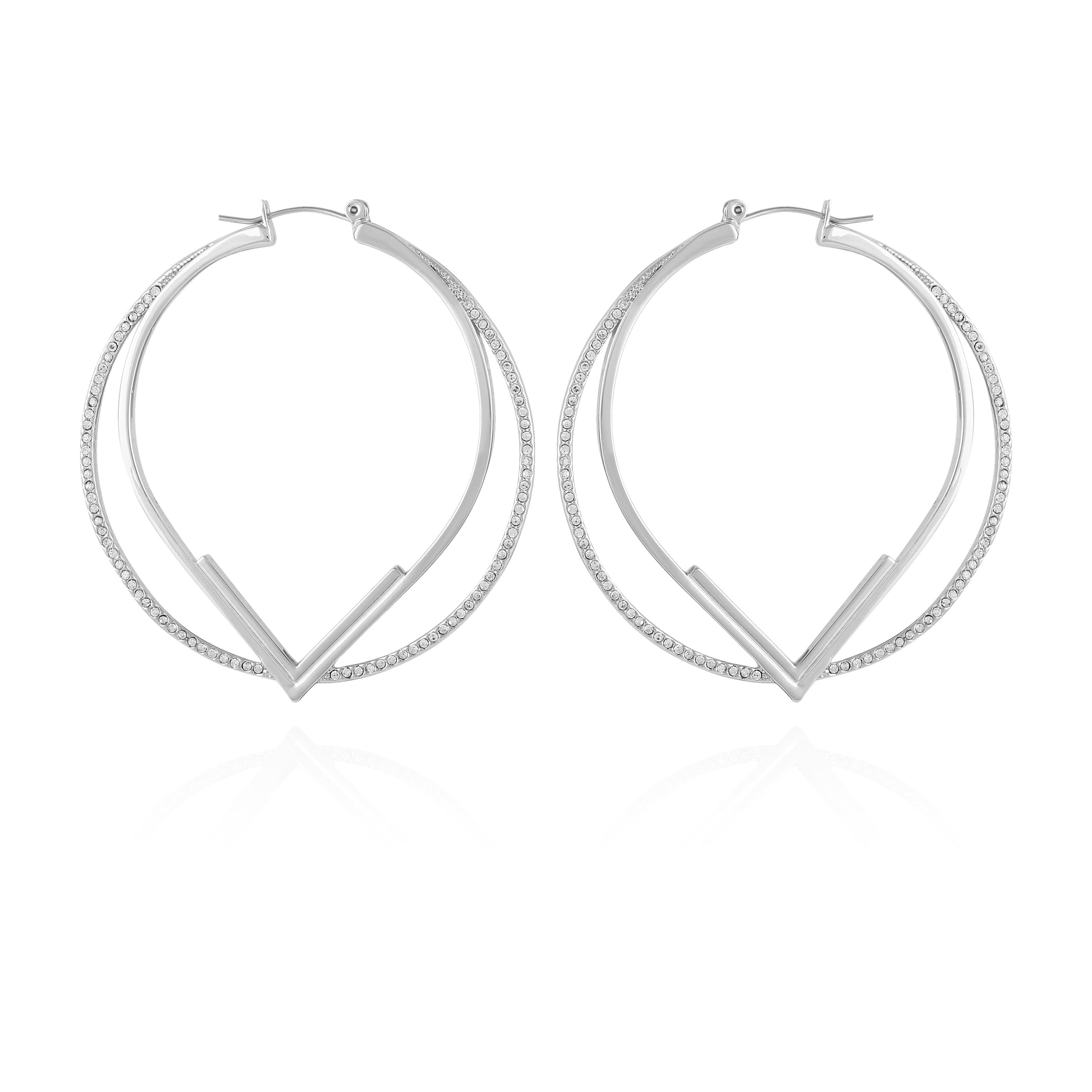 The Vince Camuto Double Hoop V Pave Earrings feature silver-tone hoops with a V-shaped design and sparkling crystals along the outer edge, shown against a white background.