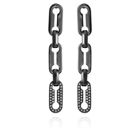 Vince Camuto Hematite Link Dangle Drop Earrings feature three black chain-link oval links, with the bottom link encrusted in crystal pavé stones, displayed on a white background.