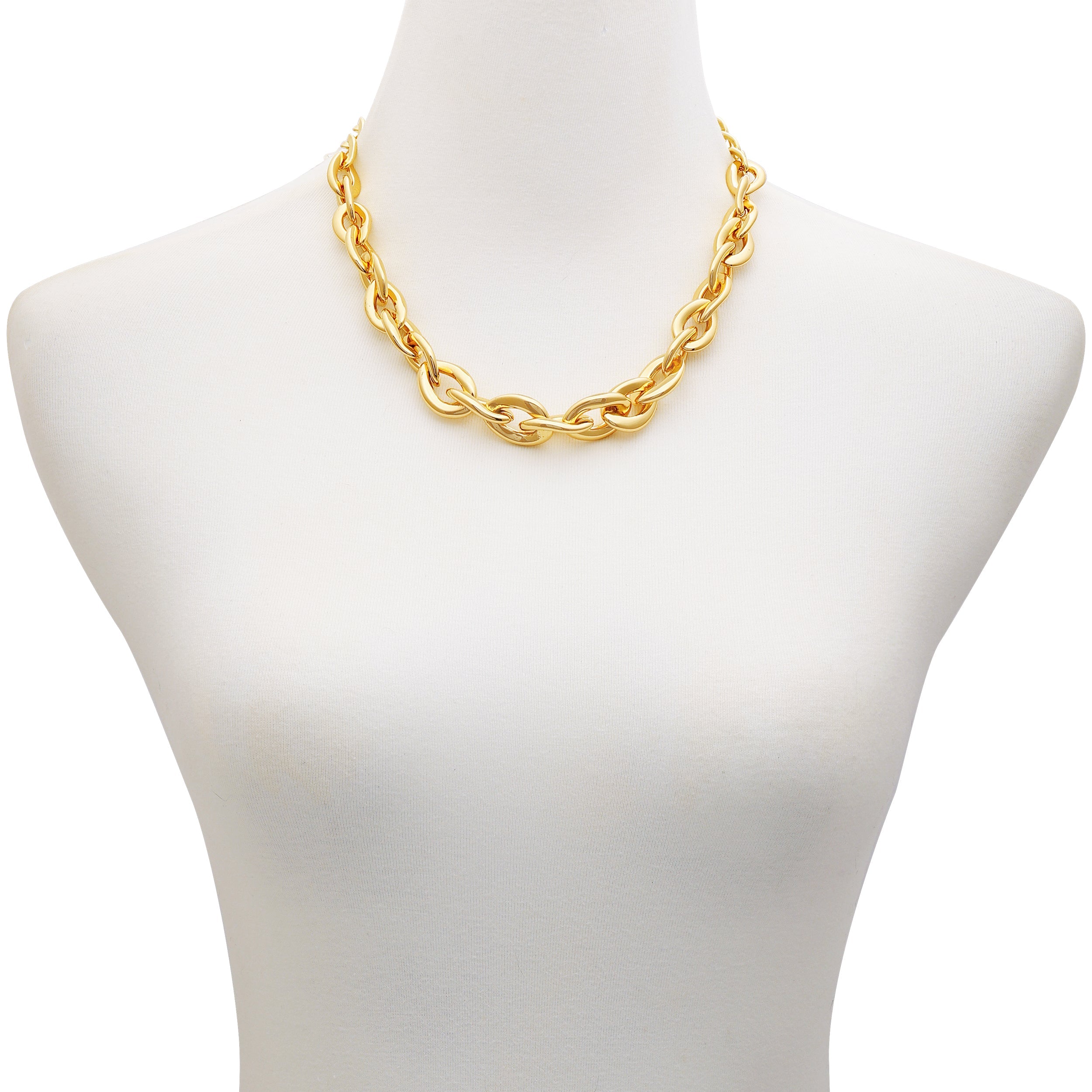 The Vince Camuto Goldtone Chunky Link Chain Necklace, featuring bold oval links, is displayed on a white mannequin bust—a striking modern accessory for any occasion.