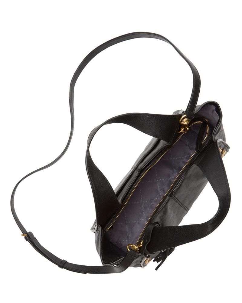 The black Aleah Satchel Bag by Vince Camuto features a gold zipper, a long shoulder strap for crossbody wear, and a quilted gray interior. Shown from above with the main compartment open and empty.