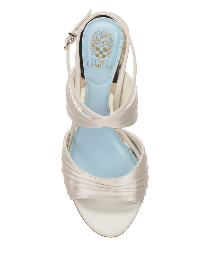 A top view of the Vince Camuto Altnori Sandal shows an ivory open toe, blue insole, and stylish crossed front straps.