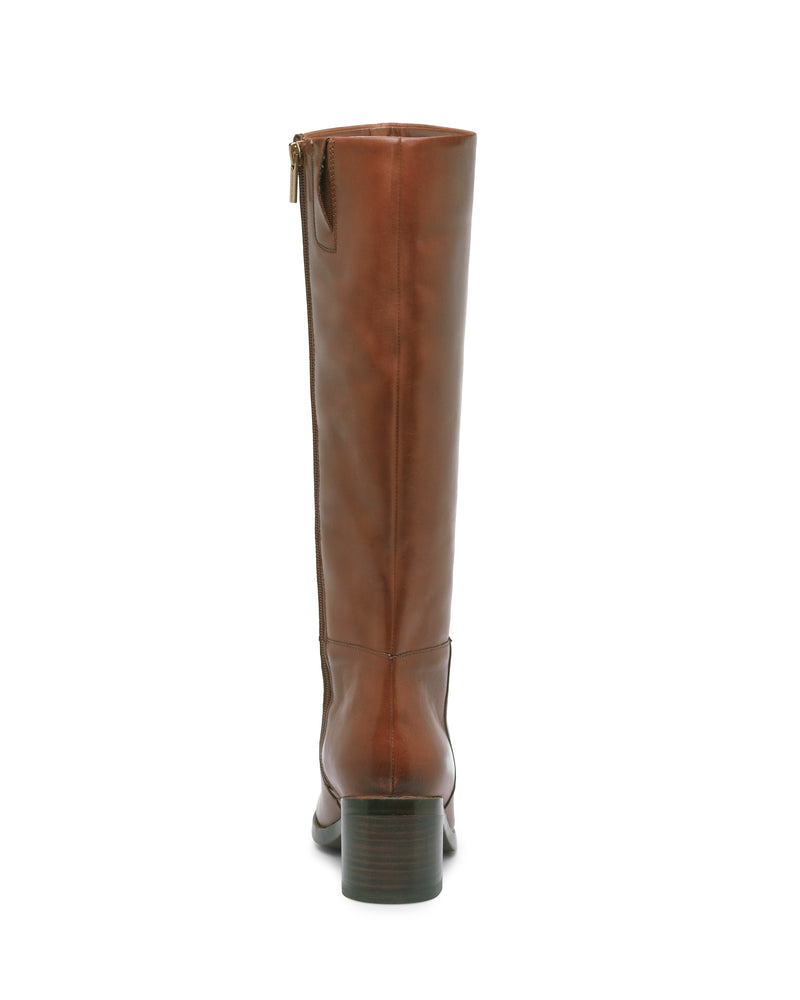 A tall brown leather Ammar Narrow Calf Knee High Boot by Vince Camuto, featuring a side zipper, is shown from the back to highlight its low block heel and smooth finish—combining classic style with everyday comfort.