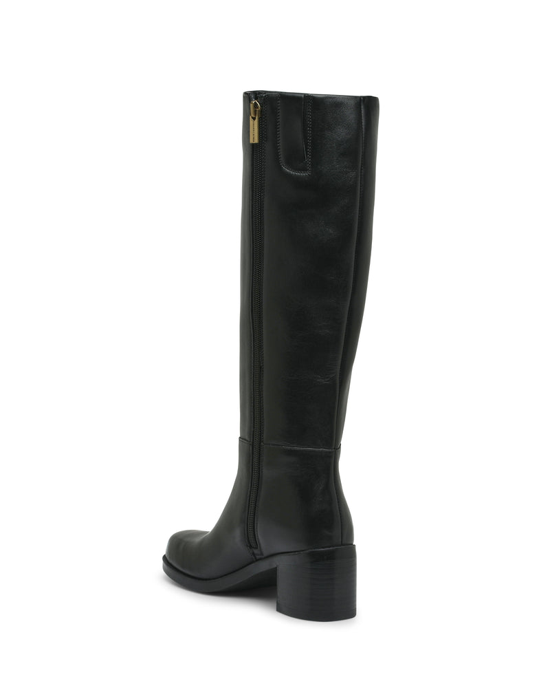 The Ammar Wide Calf Knee High Boot by Vince Camuto features black leather, a side zipper, and a low block heel. Shown from a rear side angle against a white background, this versatile style is the perfect addition to any casual wardrobe.