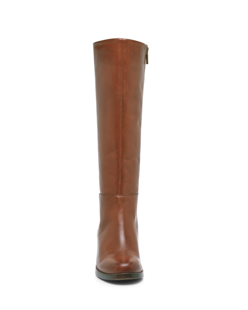 Front view of the Vince Camuto Ammar Extra Wide Calf Knee High Boot, featuring tall brown leather construction, a rounded toe, and a slight block heel, photographed against a white background—an ideal addition to any casual wardrobe.