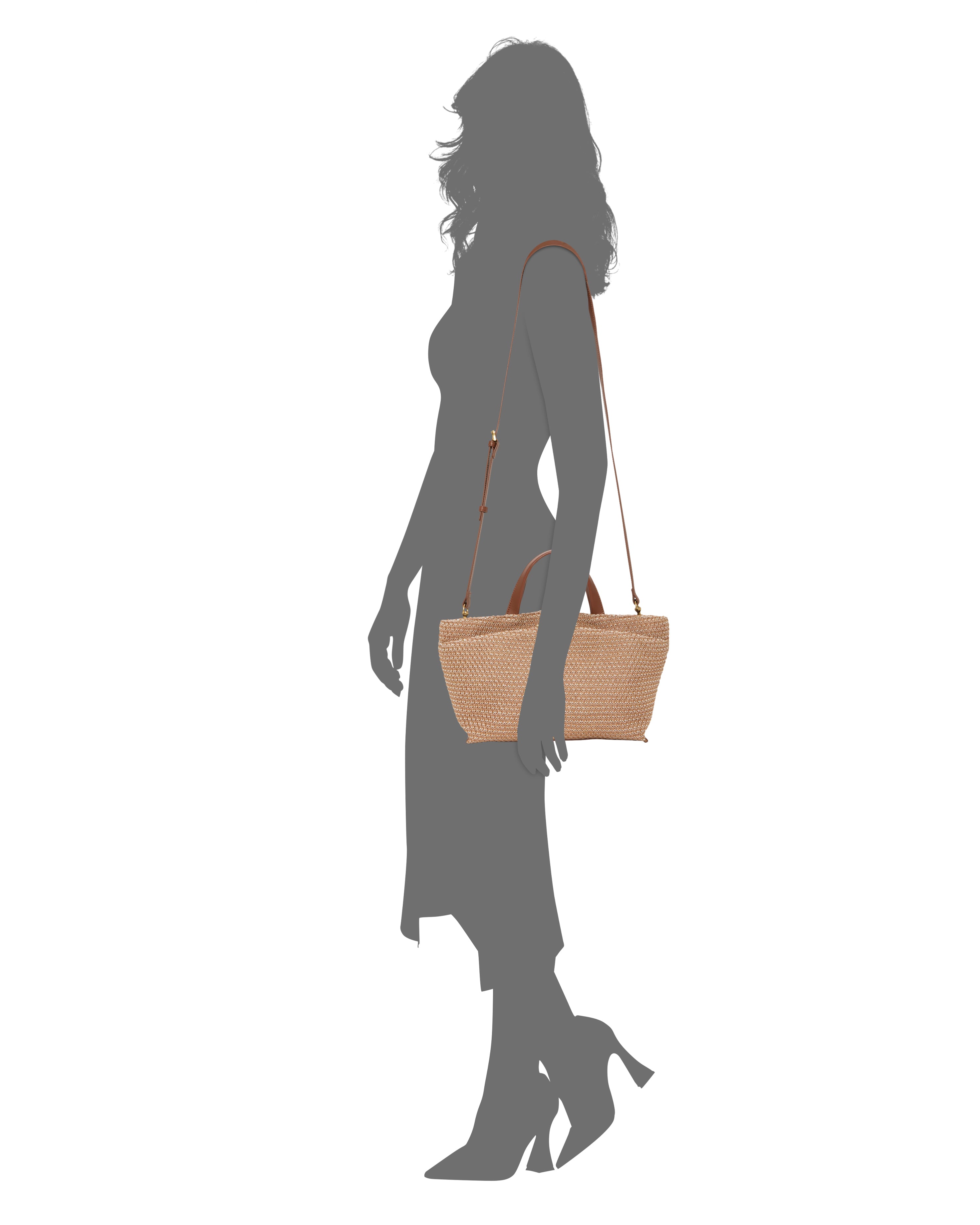 A woman in a dress and heels holds the Vince Camuto April Satchel Bag, a woven tan handbag with brown leather straps, set against a white background.