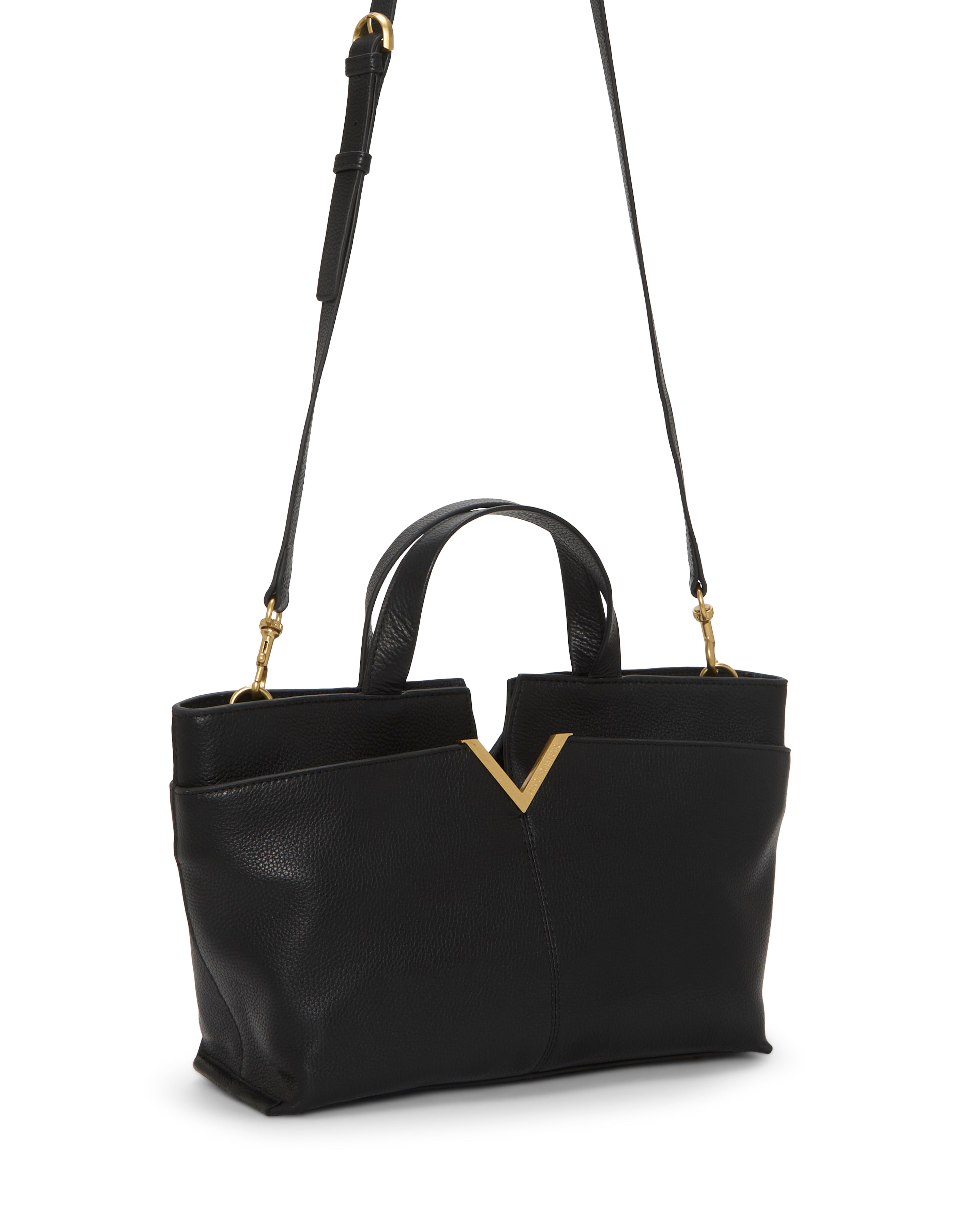 The Vince Camuto April Satchel Bag is a black leather handbag with gold accents, a V-shaped gold detail near the opening, dual handles, and a long adjustable shoulder strap.