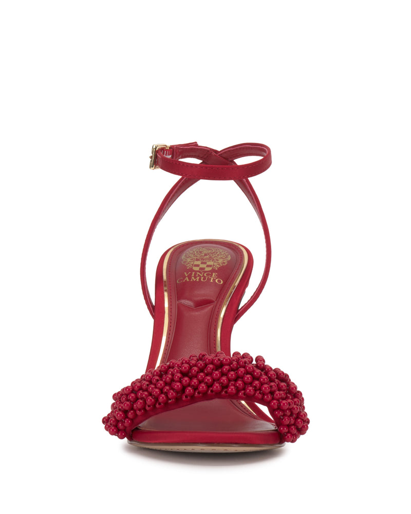 Front view of the Arleem Sandal by Vince Camuto, a red high heel with an ankle strap and beaded toe strap detail, perfect for formal occasions. Features a gold-branded insole.