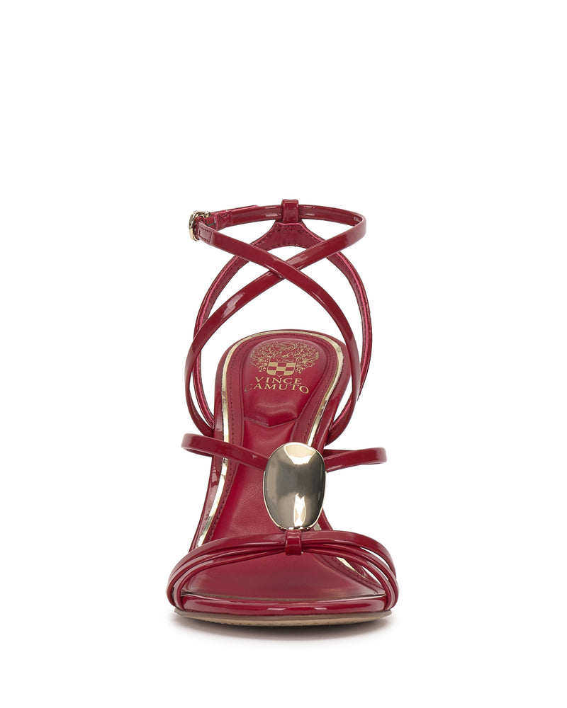 Front view of the Vince Camuto Arlein Sandal—a red high-heeled sandal with strappy design, sharp heel, metallic oval toe accent, gold ankle buckle, and embossed logo insole. Ideal for a chic night-out look.