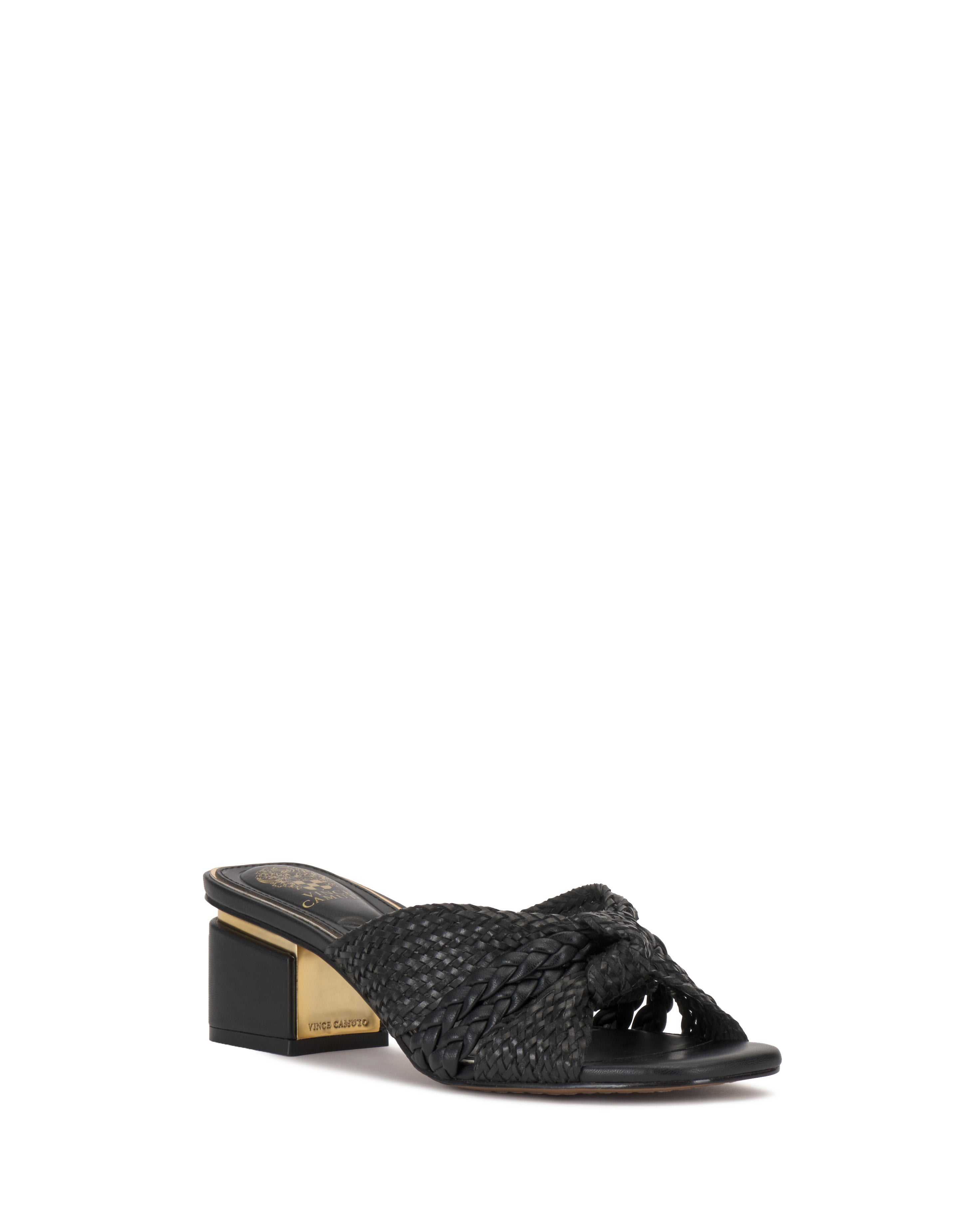 The Vince Camuto Atemly Knotted Sandal features black braiding, an open toe, chunky block heel with gold accent, woven knot detail on the upper, and a visible brand label on the insole.