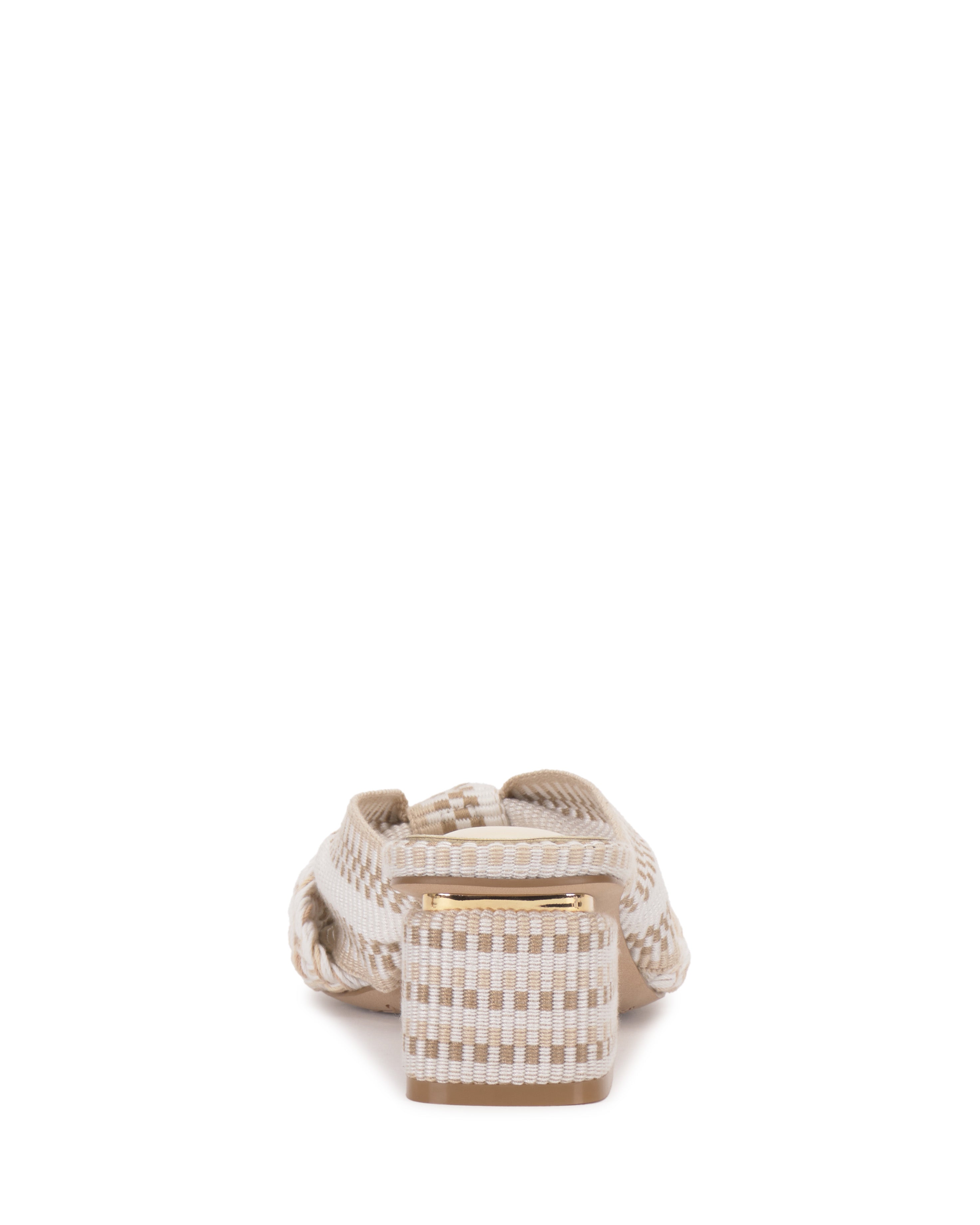 Rear view of the Vince Camuto Atemly Knotted Sandal in beige and white, featuring a braided strap design, woven detailing, low block heel, and a checkered pattern on the heel that complements the upper.