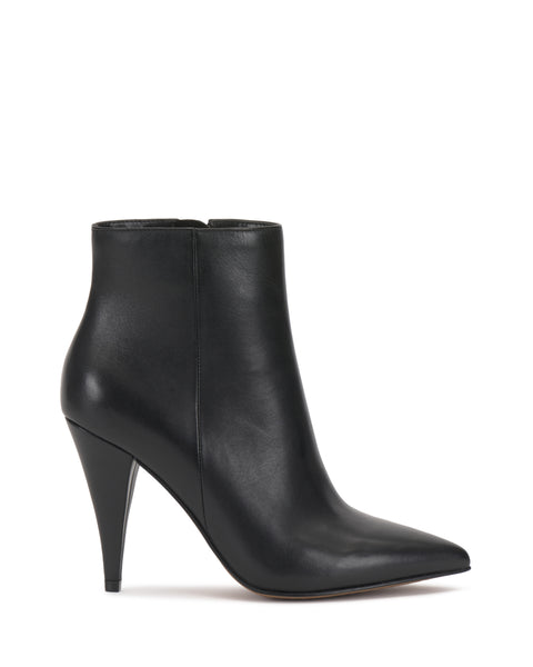 The Attiza Bootie by Vince Camuto is a sleek black leather ankle bootie with a pointed toe and high cone-shaped heel, displayed in profile against a white background.