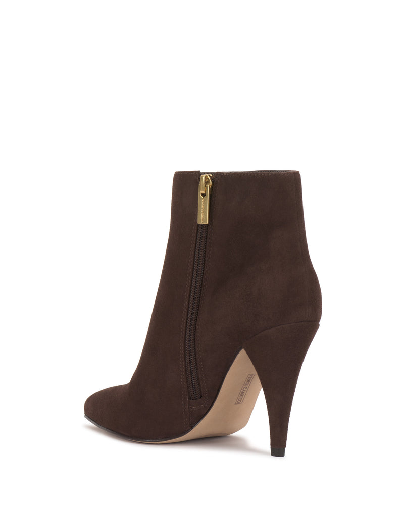 The Attiza Bootie by Vince Camuto features brown suede, a pointed toe, high heel, and gold side zipper. Viewed from the side, it showcases a curved design and sleek silhouette.