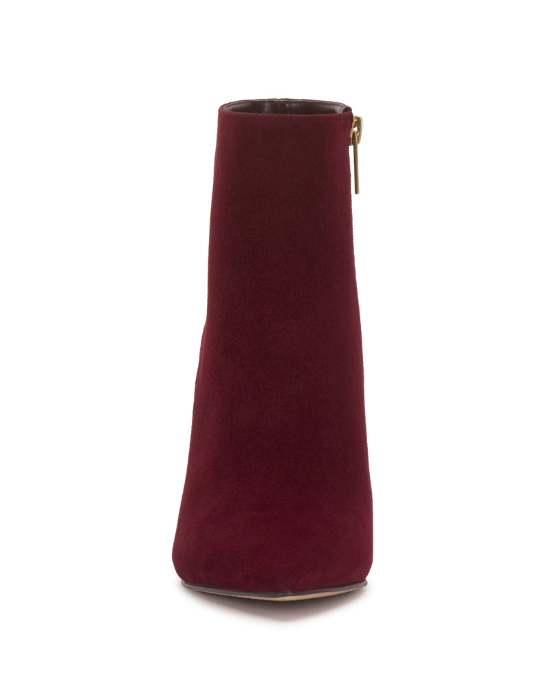 Front view of the Vince Camuto Attiza Bootie, a burgundy suede high heel ankle bootie with a pointed toe and side zipper, displayed against a plain white background.