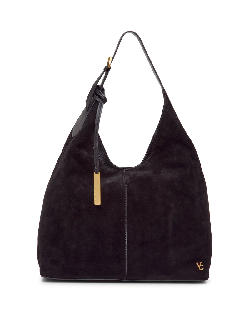 Black suede Vince Camuto Aylla Hobo bag with a shoulder strap, gold hardware, and a hanging rectangular charm, serving as a sophisticated and versatile accessory.