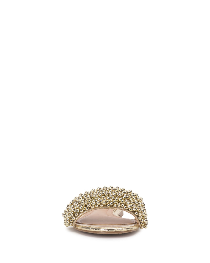The Vince Camuto Balea Beaded Sandal, featuring a beaded design, is displayed upright on a plain white background.