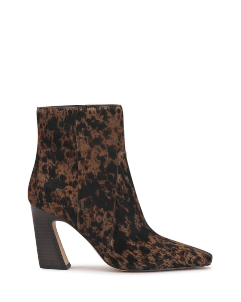 Introducing the Bayla Bootie by Vince Camuto—a sleek, modern ankle boot featuring a pointed toe, block heel, and striking brown and black leopard print. Crafted with a suede-like textured material, this boot is designed to make a statement.