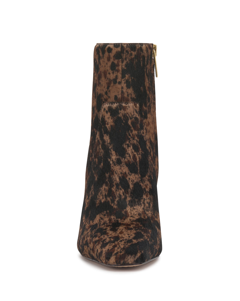 Front view of the Vince Camuto Bayla Bootie—a brown and black animal print ankle boot featuring a side zipper and rounded toe—shown against a white background.