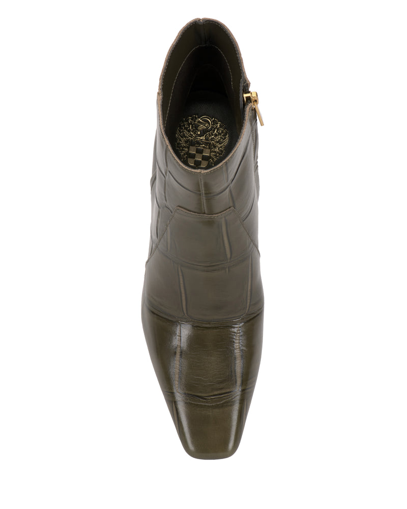 Top view of a single dark green, crocodile-textured leather Bayla Bootie by Vince Camuto, featuring ankle height, a square toe, and a gold side zipper for effortless style.