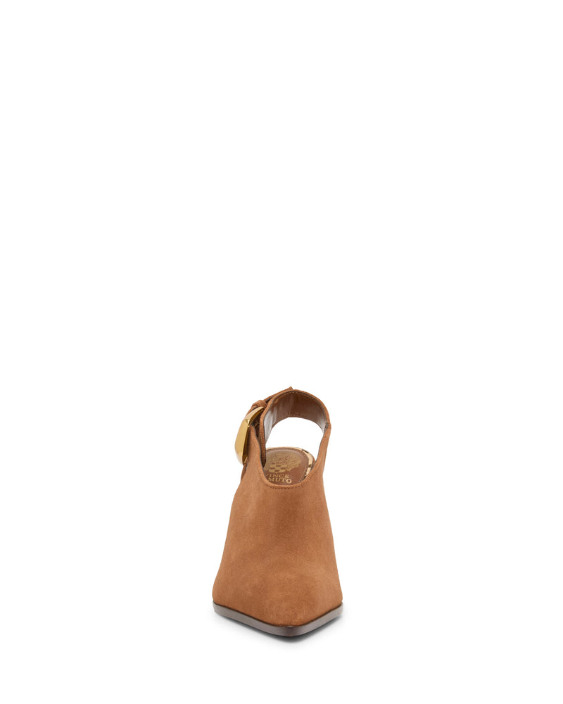 Front view of the Vince Camuto Baylez Buckled Mule in brown suede, featuring a pointed toe, gold buckle strap, and high heel. The single shoe is centered against a plain white background.