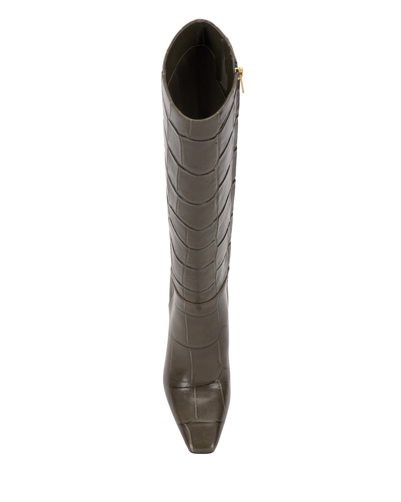 A top-down view of a single tall, dark olive green Vince Camuto Bennidy Wide Calf Knee High Boot with a square toe and crocodile-embossed texture, featuring a side zipper and a chic block heel—an effortless wardrobe staple.