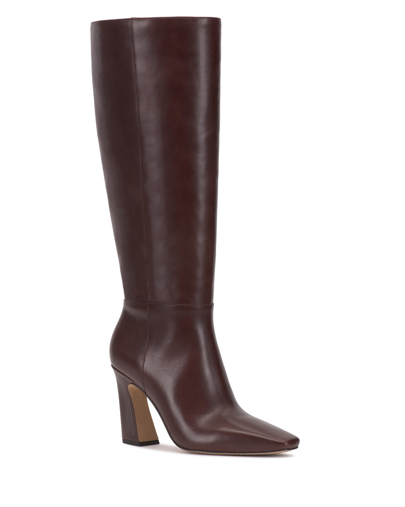 A tall, dark brown Vince Camuto Bennidy Extra Wide Calf Knee High Boot with a pointed toe and a high block heel, displayed against a white background.