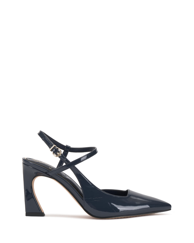 The Vince Camuto Bevarin Pump, a navy blue patent leather high heel featuring a pointed toe, side cutout, and ankle strap, is displayed in profile on a white background.
