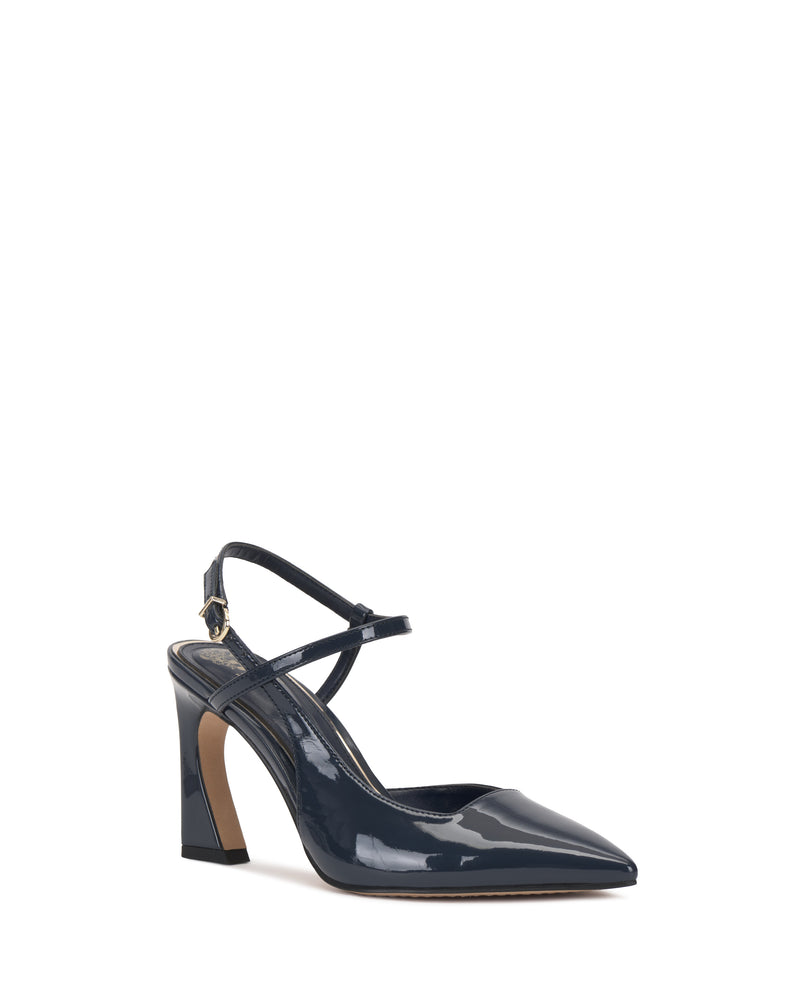 The Vince Camuto Bevarin Pump is a single dark blue patent leather high-heeled shoe featuring a pointed toe, block heel, and a crisscross ankle strap with a small gold buckle.