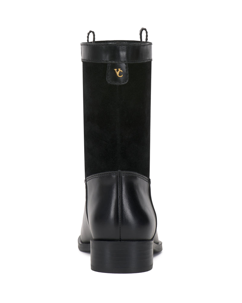 Back view of the Vince Camuto Bezzley Bootie in black leather and suede, featuring a small gold VC emblem near the top and a low block heel.