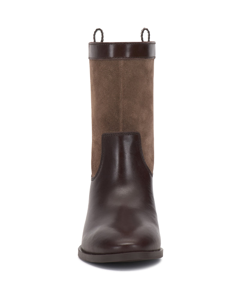Front view of the Vince Camuto Bezzley Bootie, featuring dark brown leather on the foot and top sections, a lighter brown suede panel in the middle, and two pull loops at the top.