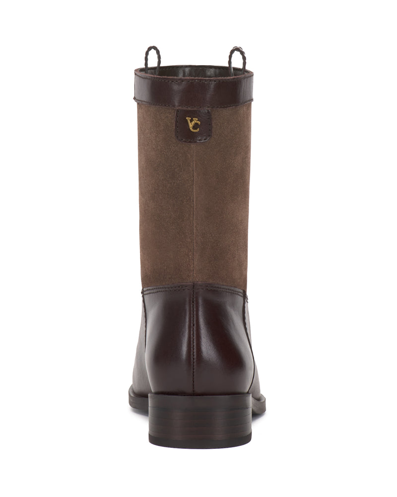 The Bezzley Bootie by Vince Camuto, shown from the back, features brown leather and suede construction, a low heel, pull tabs on each side, and a small gold logo near the top.