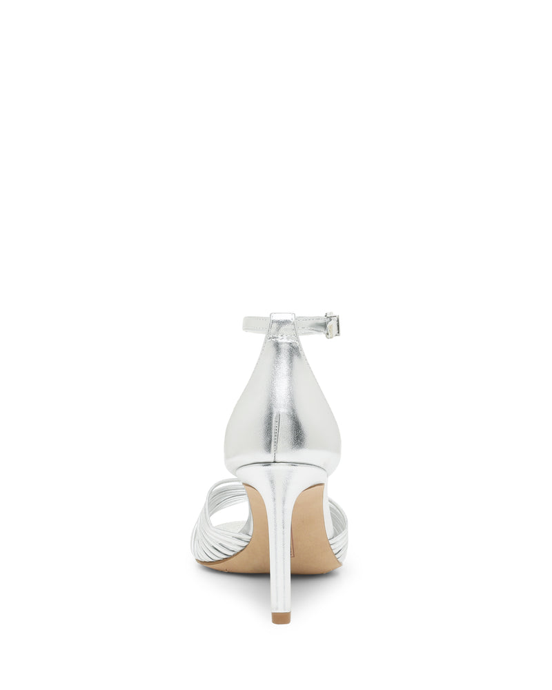 Back view of the silver, reptile-embossed Vince Camuto Blaine Sandal featuring a skinny ankle strap and a tall heel.