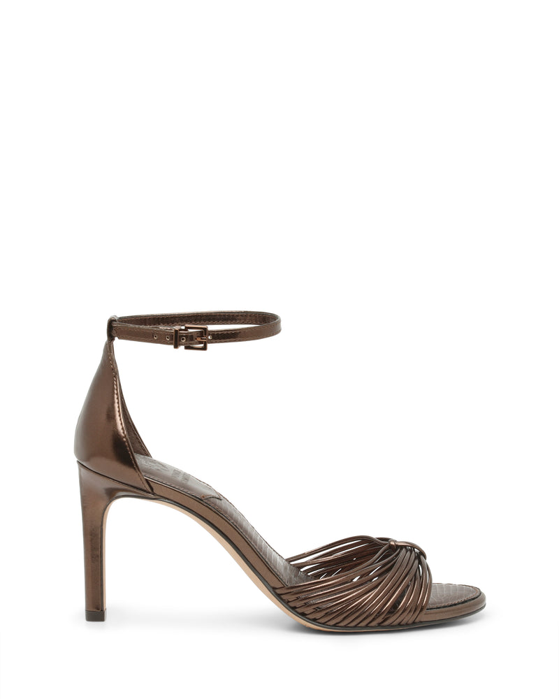 Blaine Sandal in metallic bronze, featuring a reptile-embossed high-heeled design with an ankle strap and thin, gathered straps across the toe.