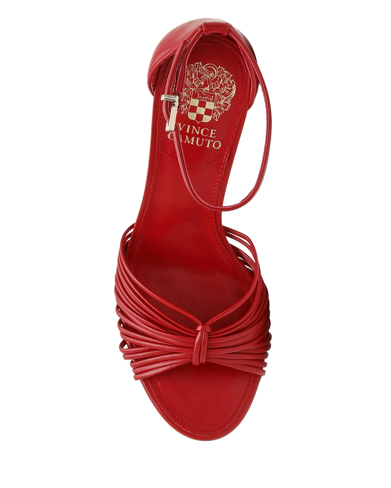 Red Vince Camuto Blaine Sandal featuring reptile embossing, a knotted multi-strap toe, a tall heel, and a skinny ankle strap with buckle closure.