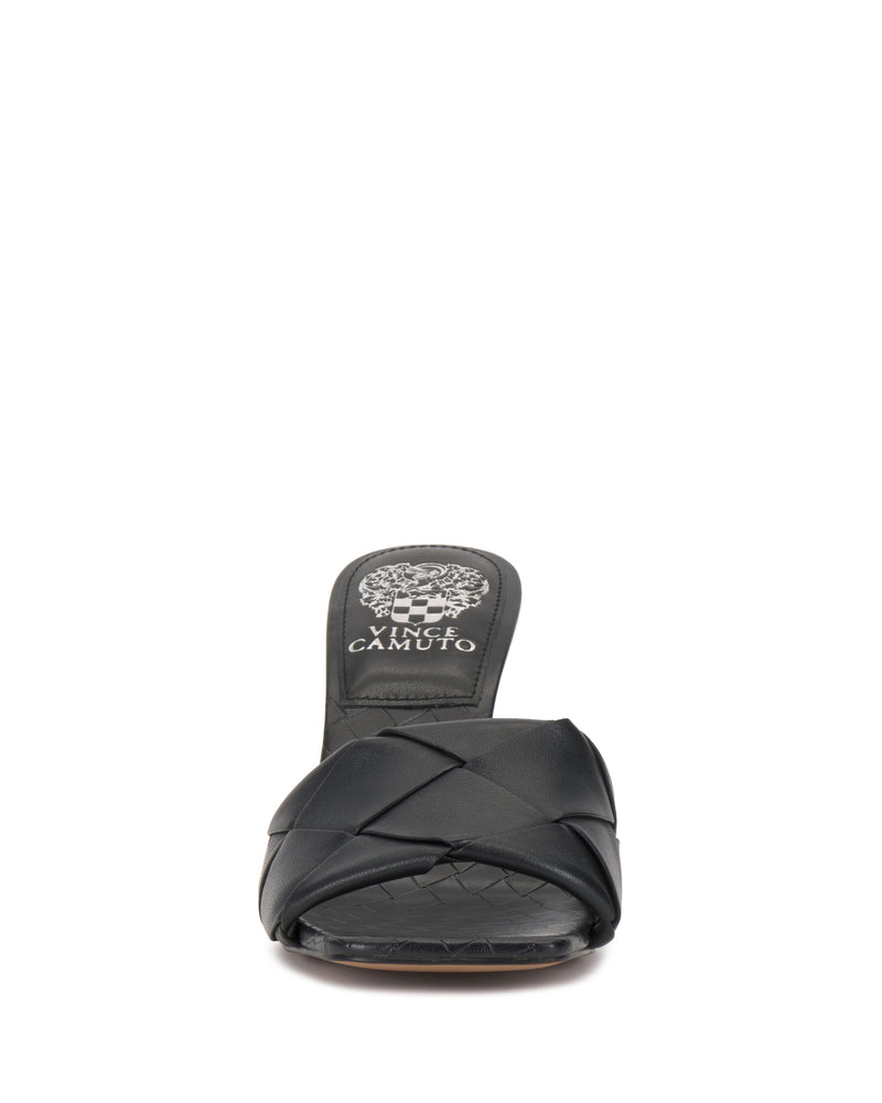 Front view of the Vince Camuto Brelanie Woven Mule, a black slip-on sandal featuring a woven leather strap, open toe, and Vince Camuto branding on the insole.