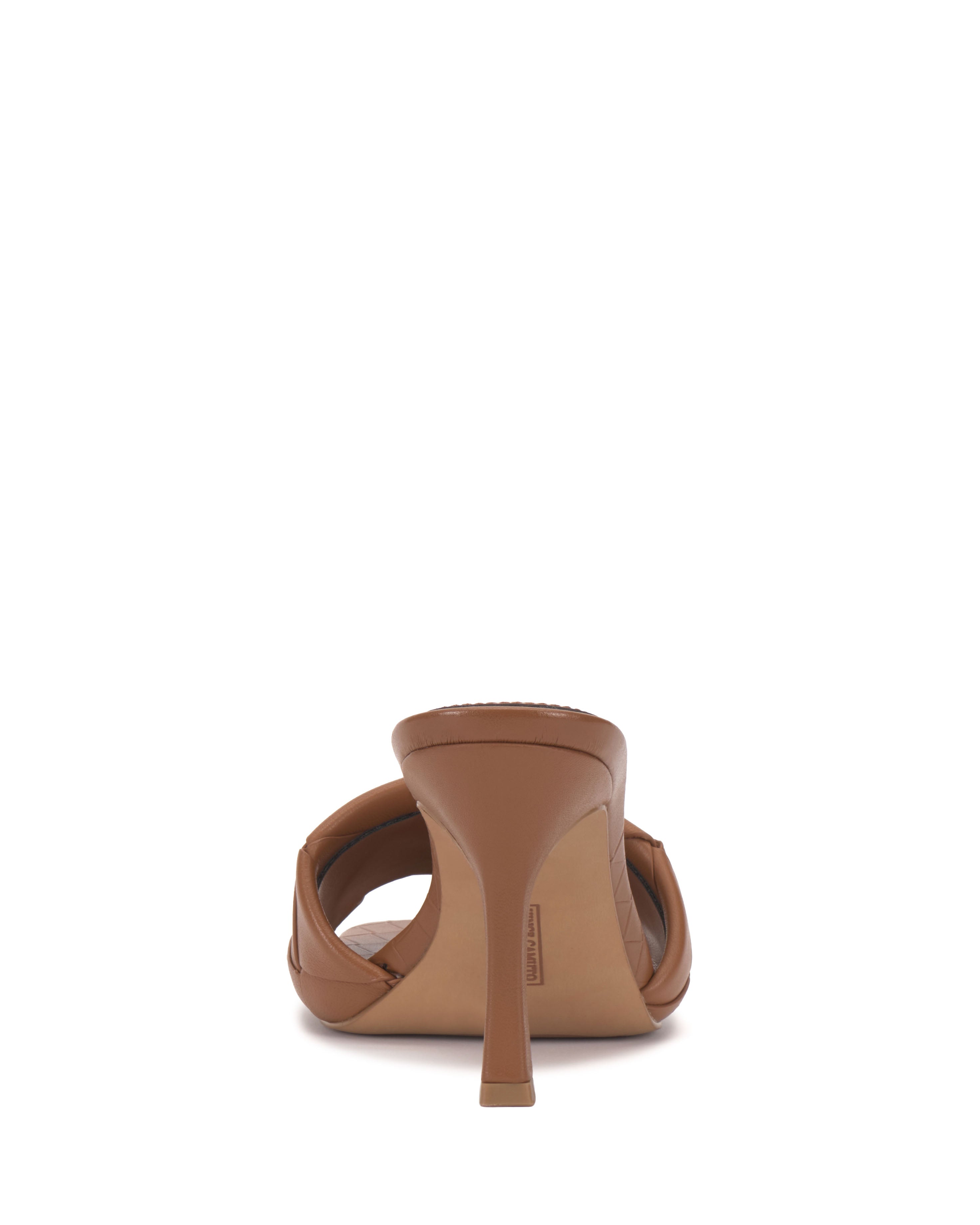 The Vince Camuto Brelanie Woven Mule is a brown high-heeled sandal with braided straps and a single stiletto heel, shown from the back on a plain white background.