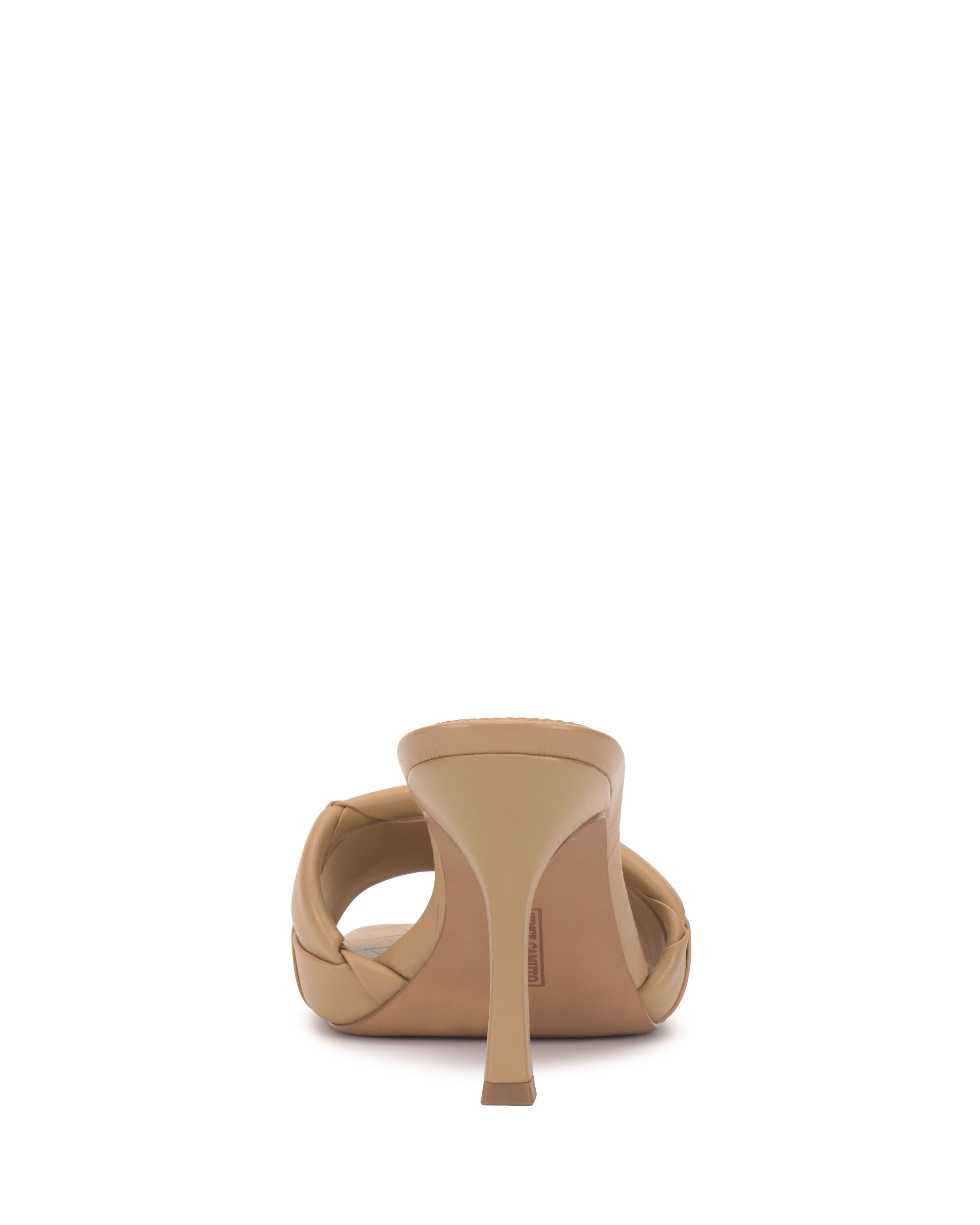 A rear view of the Brelanie Woven Mule by Vince Camuto, a beige high-heeled shoe featuring a quilted design, displayed against a plain white background.