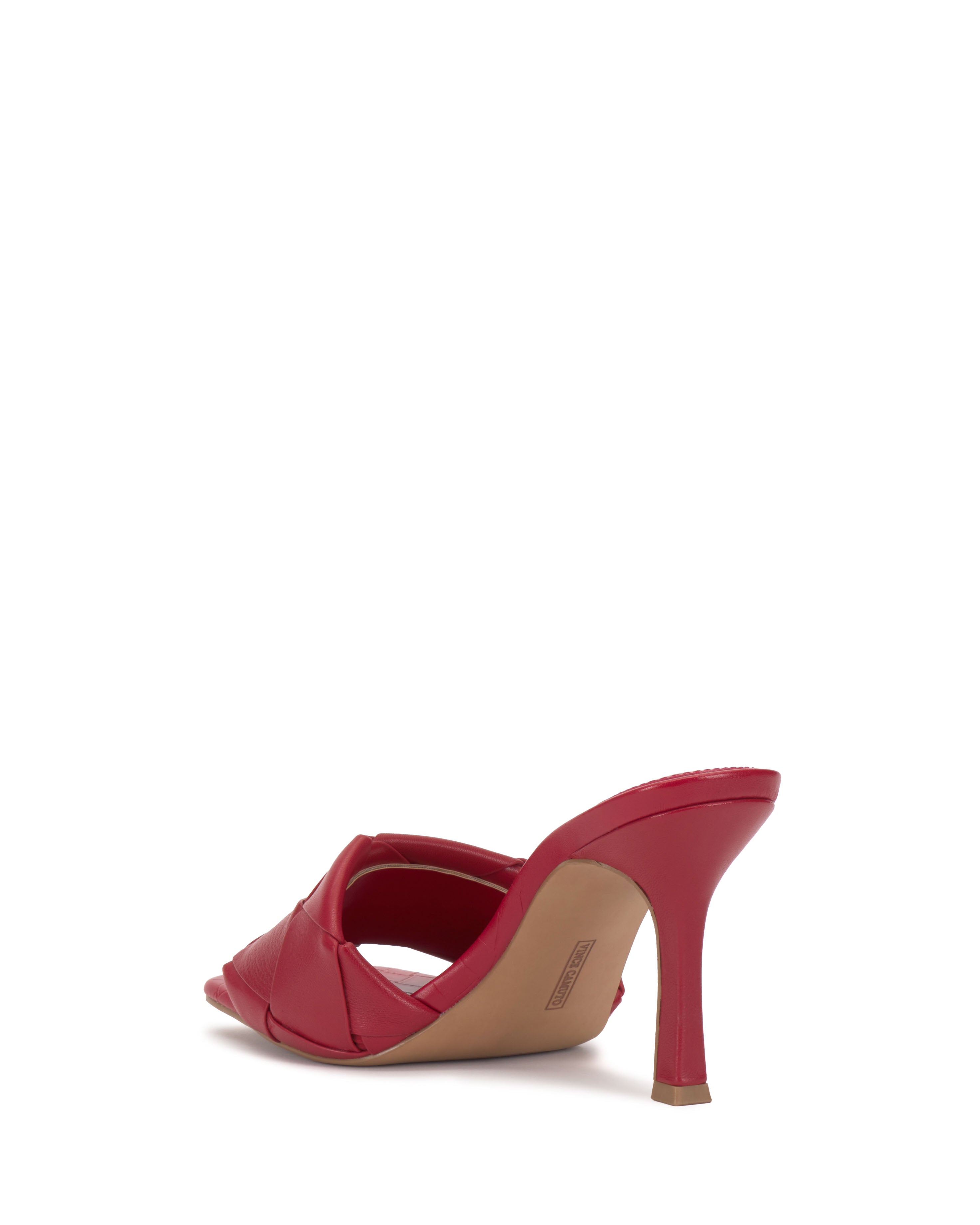 The Vince Camuto Brelanie Woven Mule is shown from the back and side, featuring a red quilted design, open toe, and woven strap, set against a plain white background.