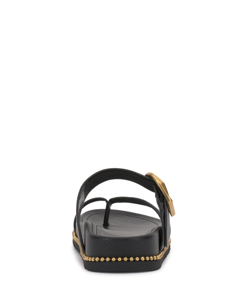 Rear view of the Vince Camuto Camilo Slide in black, showcasing a side buckle strap with gold buckle and small gold studs detailing the edge of its contoured footbed.