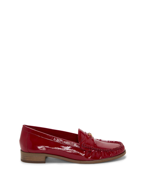 The Vince Camuto Colin Loafer is a shiny red patent leather slip-on with a low brown wooden heel and moc toe stitching, shown against a plain white background.