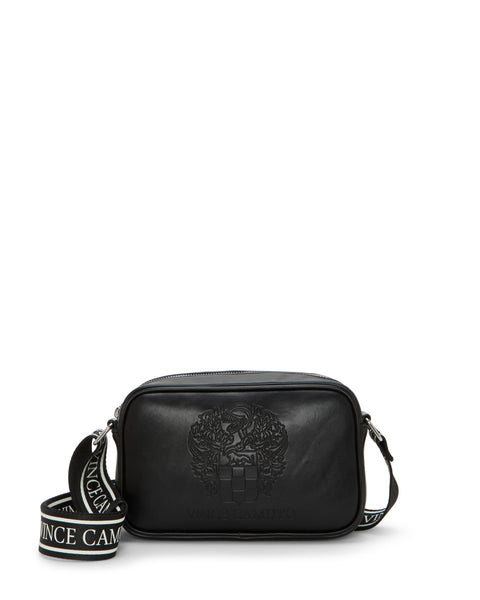 A black Vince Camuto Dalle Crossbody Bag with an embossed logo on the front and a wide black-and-white logo webbing strap, displayed against a white background.