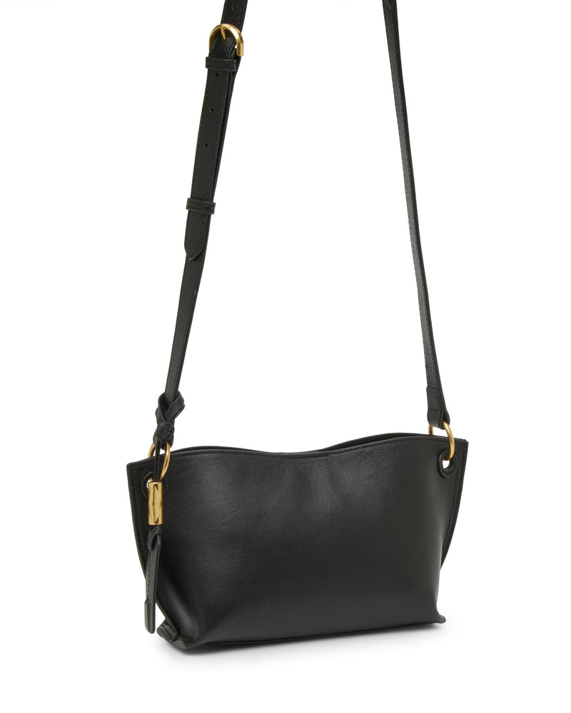The Vince Camuto Ellah Crossbody Bag is a small black leather bag with gold hardware and an adjustable strap, shown against a white background.