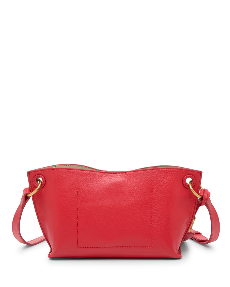 The Ellah Crossbody Bag by Vince Camuto is a bright red leather handbag with gold ring hardware and an adjustable shoulder strap. Shown from the back on a white background, it features a smooth texture and a simple, structured design.