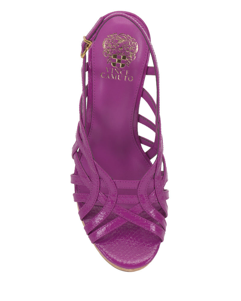 A top view of the Elody Wedge Sandal by Vince Camuto shows a vibrant pink strappy wedge with a slingback gold buckle, textured open toe, smooth finish, and insole detailed with the gold Vince Camuto logo.