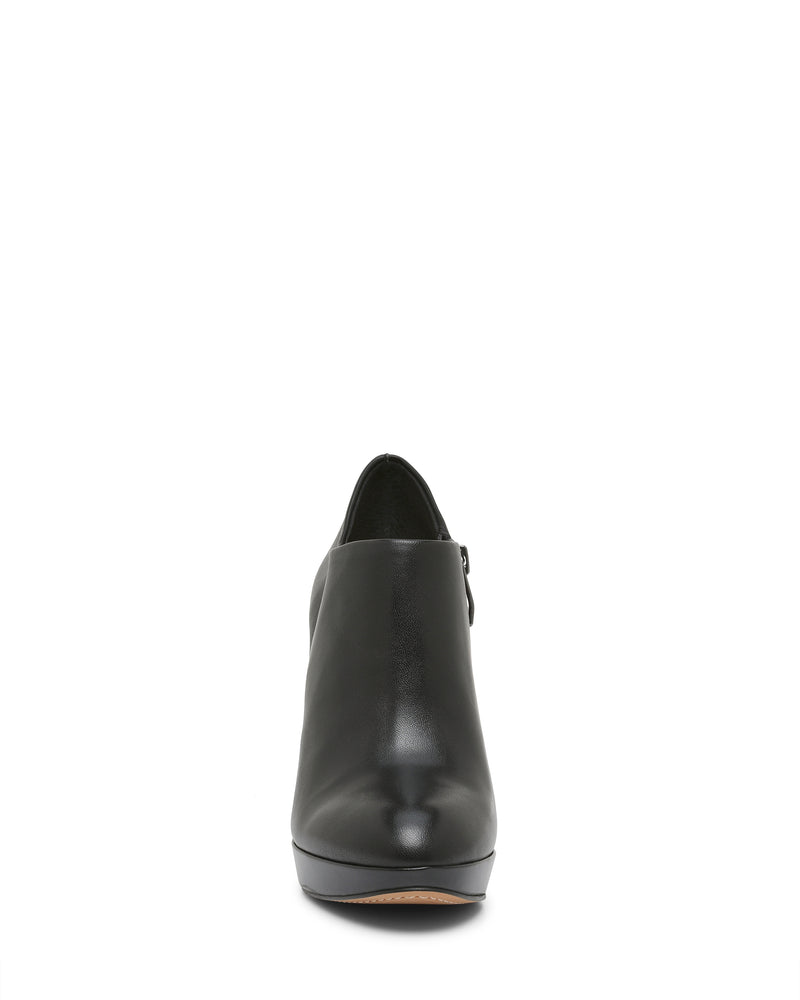 Front view of the Vince Camuto Elvin Bootie in black leather, featuring a smooth finish, closed toe, and subtle platform sole, displayed against a white background.
